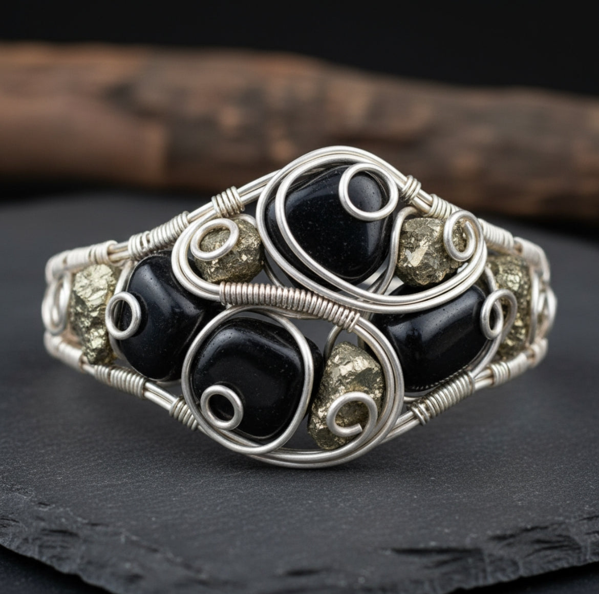 “Pyrite calls in the wealth, Obsidian guards it—abundance protected.” Custom Wire Wrapped Pyrite And Black Obsidian Dual Stone bracelet